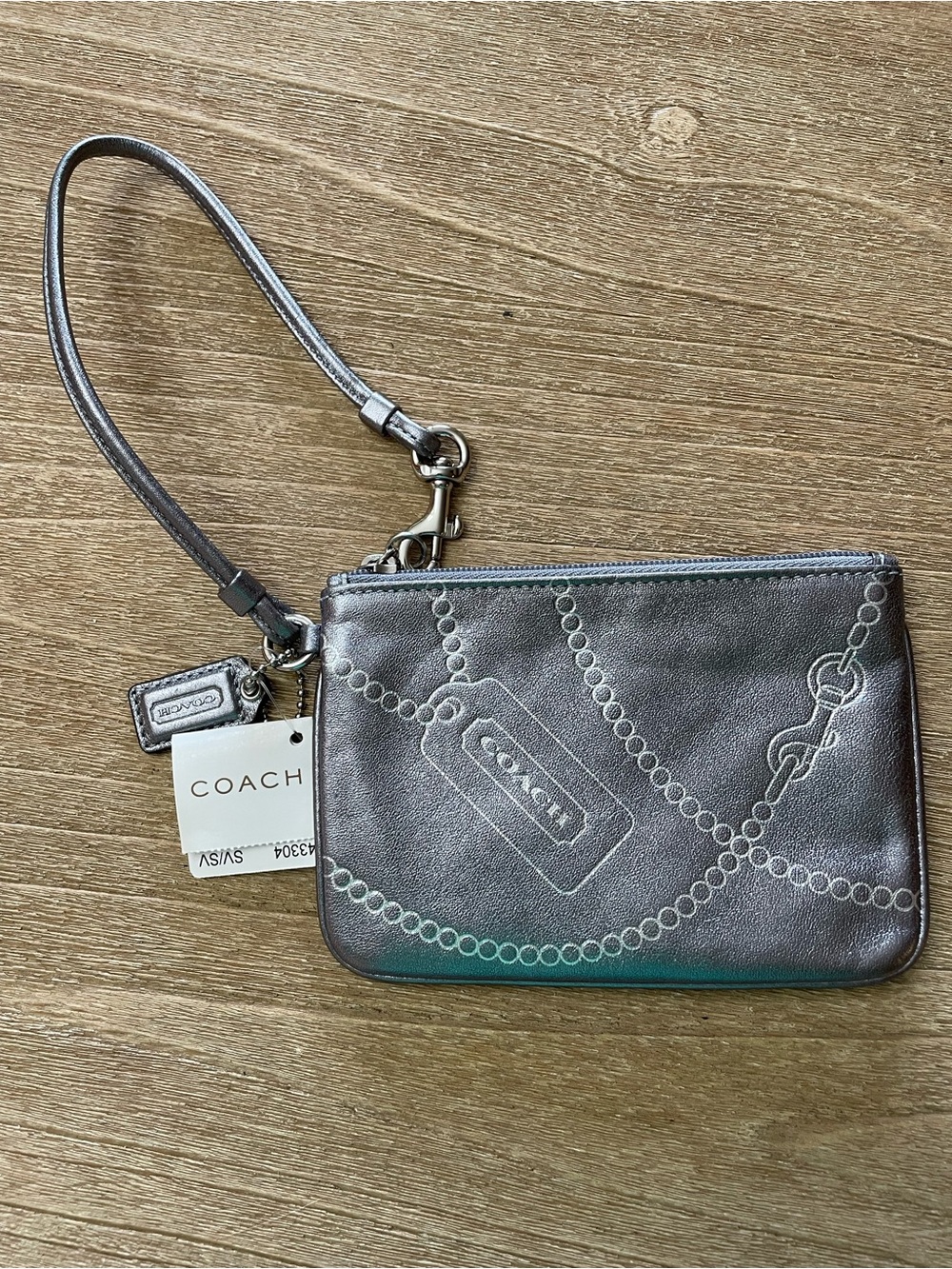 COACH Metallic Silver Leather Wristlet Pouch